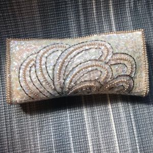 Sold Ivory hand beaded clutch